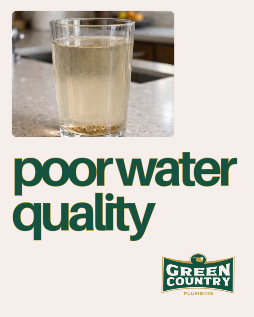 Glass of discolored water showcasing rust and sediment, emphasizing water quality concerns in homes